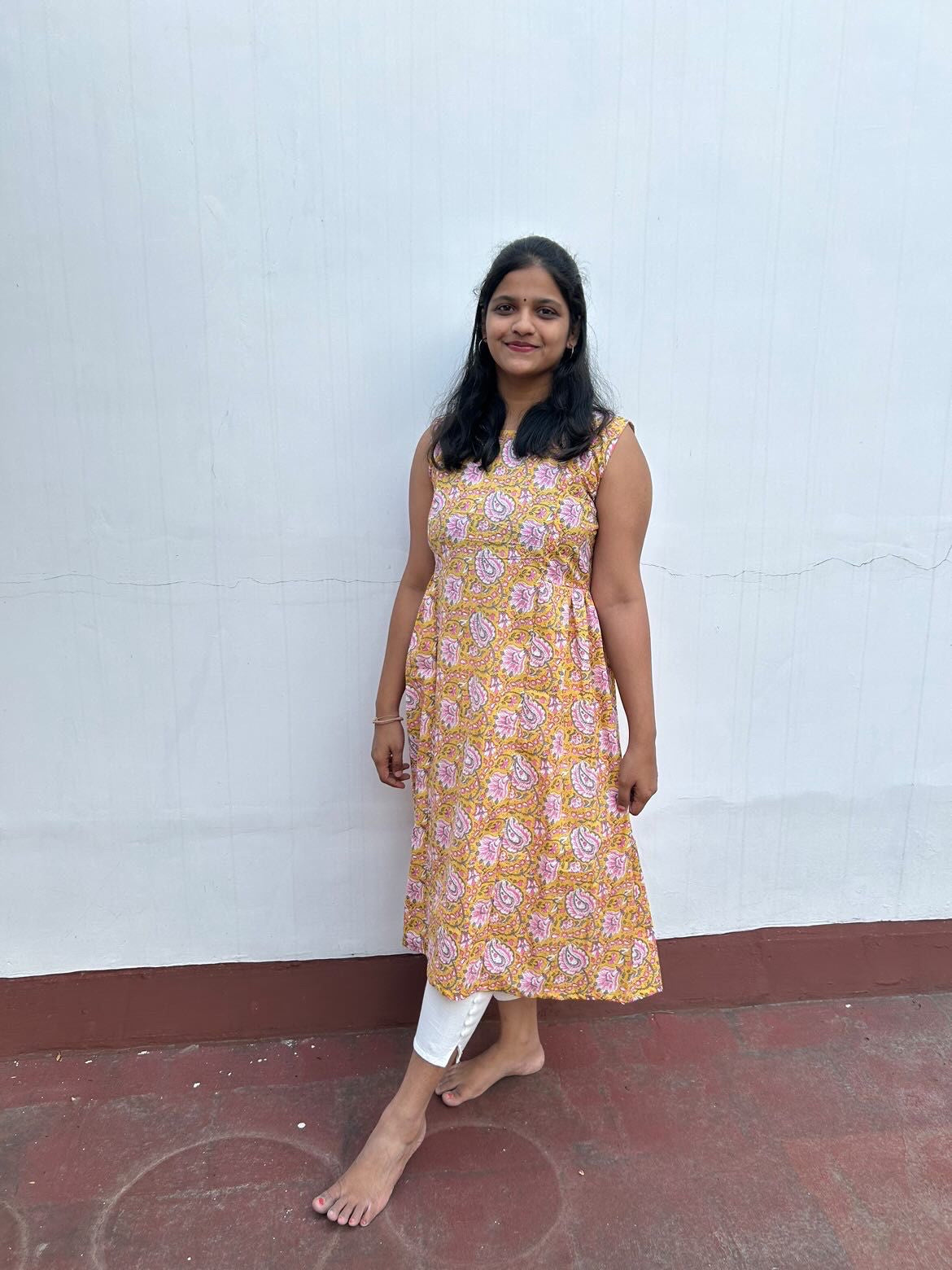 Yellow paisley side pleated top